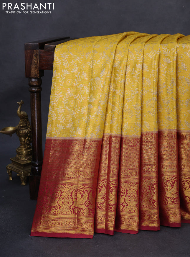 Kanchipuram tissue silk saree yellow and maroon with allover zari woven floral brocade weaves and long rich zari woven border