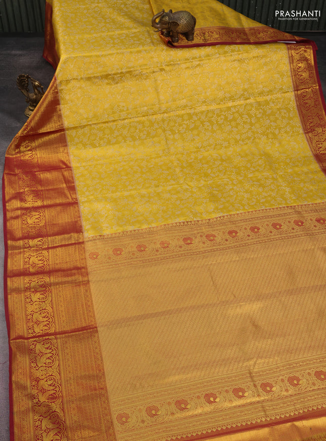 Kanchipuram tissue silk saree yellow and maroon with allover zari woven floral brocade weaves and long rich zari woven border