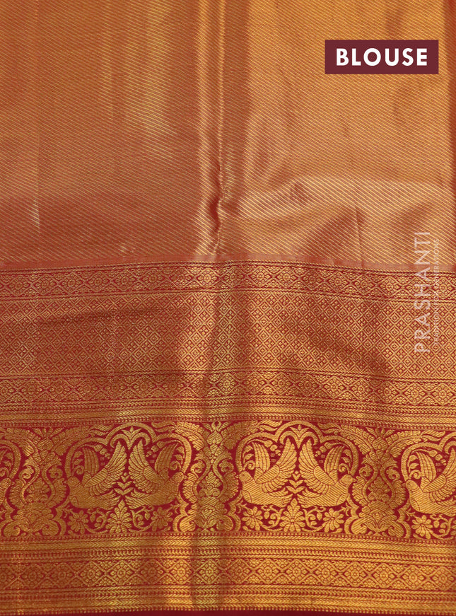 Kanchipuram tissue silk saree yellow and maroon with allover zari woven floral brocade weaves and long rich zari woven border