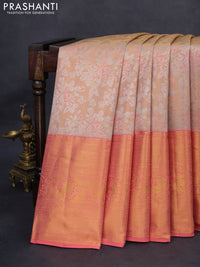 Kanchipuram tissue silk saree sandal and peach orange with allover silver zari woven floral brocade weaves and long rich zari woven border