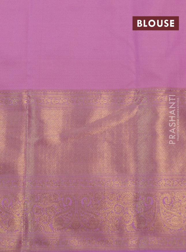Kanchipuram tissue silk saree dual shade of pink and lavender with allover zari woven floral brocade weaves and long rich zari woven border