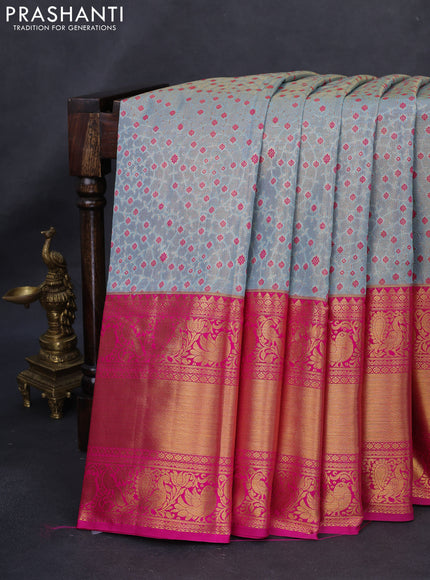 Kanchipuram tissue silk saree dual shade of pastel blue and pink with allover zari woven brocade weaves and long rich zari woven border