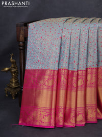 Kanchipuram tissue silk saree dual shade of pastel blue and pink with allover zari woven brocade weaves and long rich zari woven border