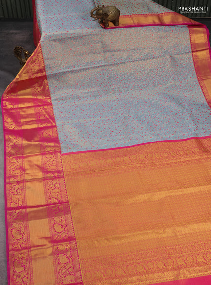 Kanchipuram tissue silk saree dual shade of pastel blue and pink with allover zari woven brocade weaves and long rich zari woven border