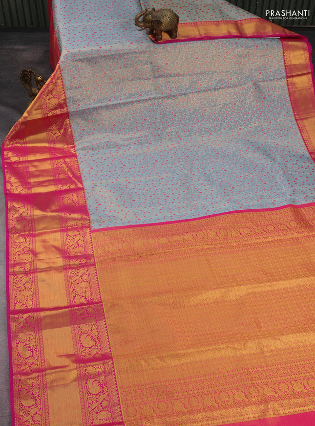Kanchipuram tissue silk saree dual shade of pastel blue and pink with allover zari woven brocade weaves and long rich zari woven border
