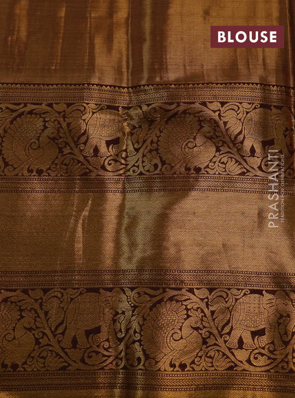 Kanchipuram tissue silk saree gold and wine shade with allover zari woven floral brocade weaves and long rich zari woven border