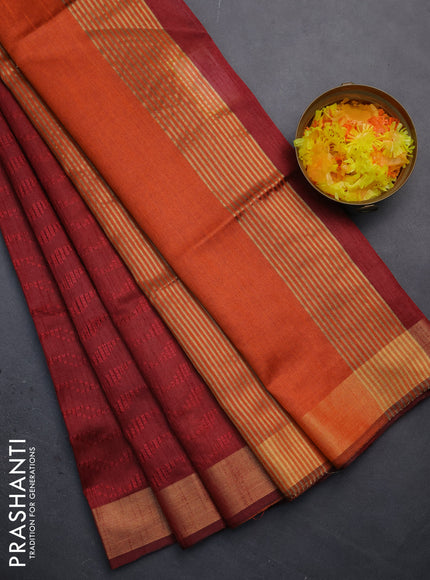 Semi dupion saree maroon and orange with allover self emboss and zari woven border