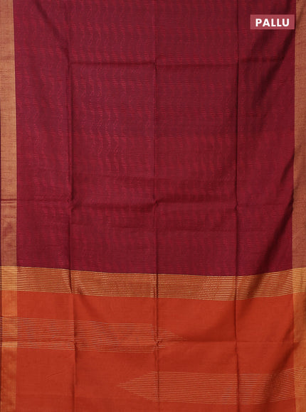 Semi dupion saree maroon and orange with allover self emboss and zari woven border
