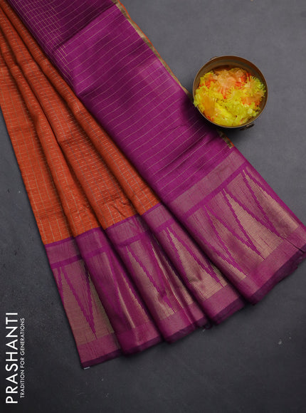 Semi dupion saree orange and purple with allover zari checks & buttas and long zari woven border