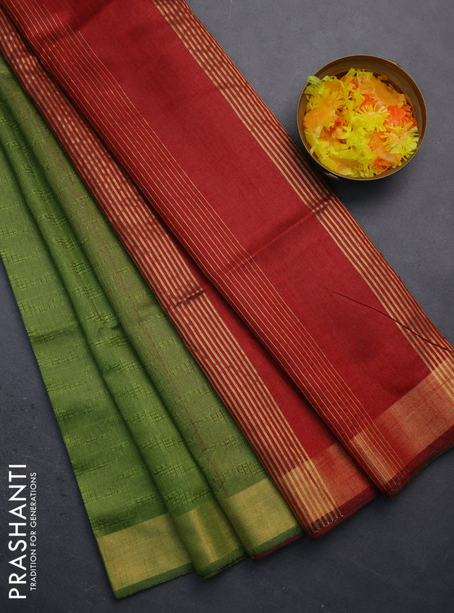 Semi dupion saree mehendi green and maroon with allover self emboss and zari woven border