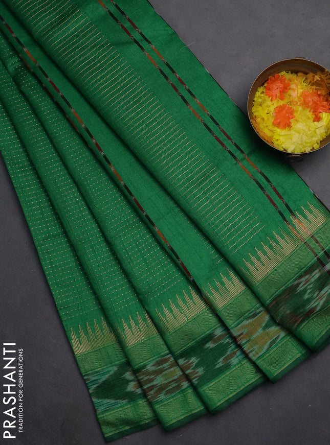 Semi dupion saree green with allover zari weaves and temple design zari woven ikat border