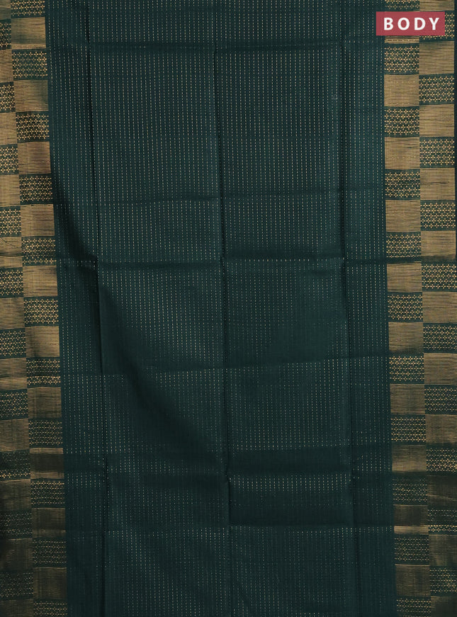 Semi dupion saree bottle green with allover zari stripe weaves and zari woven border