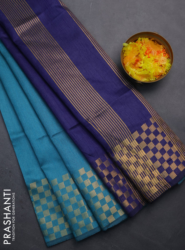 Semi dupion saree teal blue and blue with plain body and zari woven checked border