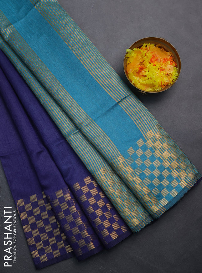 Semi dupion saree dark blue and teal blue with plain body and zari woven checked border