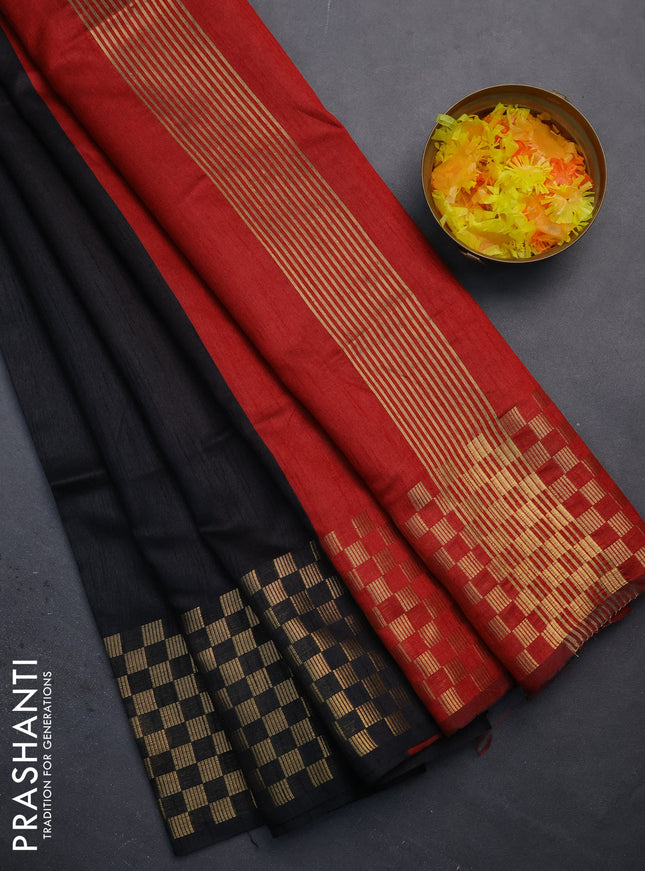 Semi dupion saree black and maroon with plain body and zari woven checked border