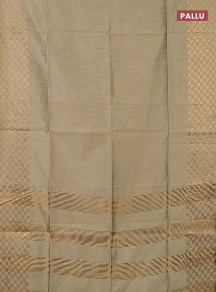 Semi dupion saree elaichi green with plain body and zari woven checked border