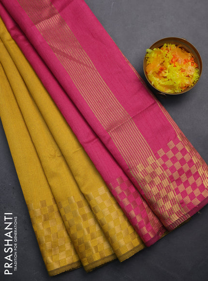 Semi dupion saree mustard yellow and pink with plain body and zari woven checked border