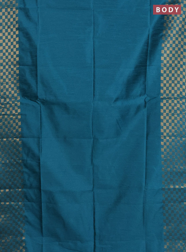 Semi dupion saree teal blue with plain body and zari woven checked border
