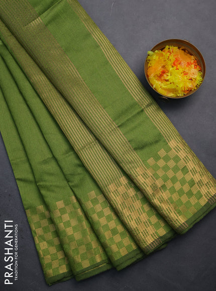 Semi dupion saree sap green with plain body and zari woven checked border