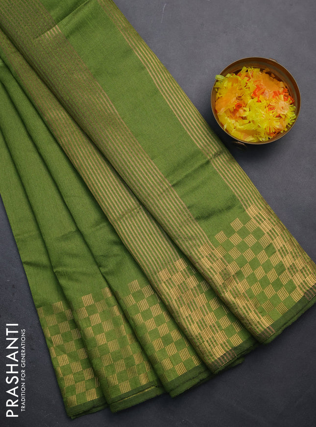 Semi dupion saree sap green with plain body and zari woven checked border