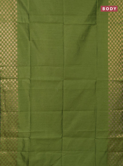 Semi dupion saree sap green with plain body and zari woven checked border