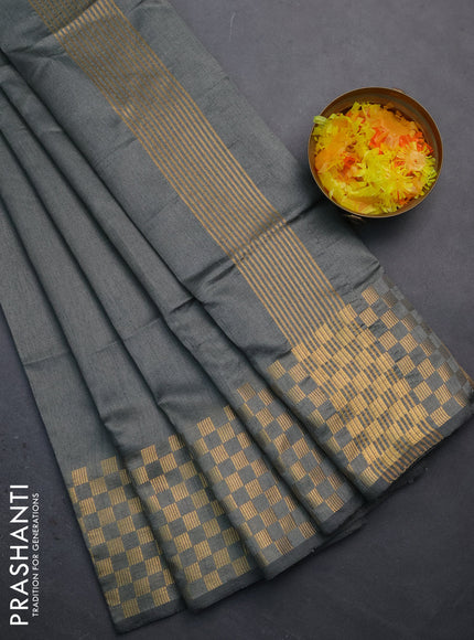 Semi dupion saree grey with plain body and zari woven checked border