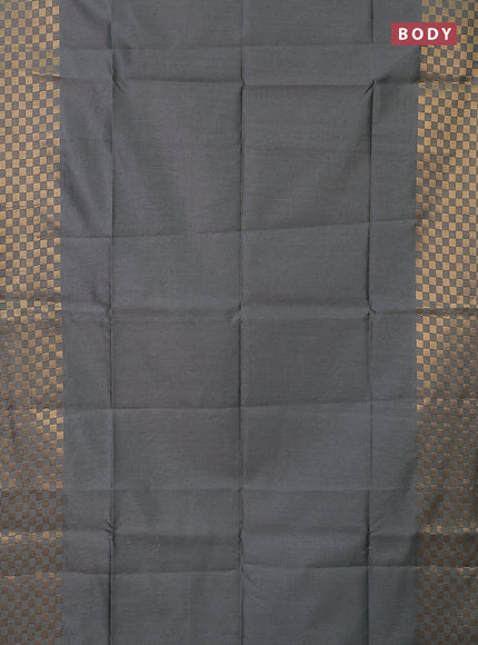 Semi dupion saree grey with plain body and zari woven checked border