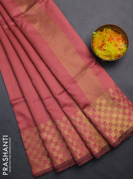 Semi dupion saree peach pink shade with plain body and zari woven checked border