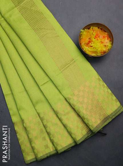 Semi dupion saree fluorescent green with plain body and zari woven checked border