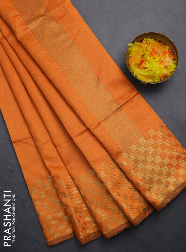 Semi dupion saree orange with plain body and zari woven checked border