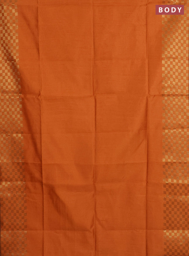 Semi dupion saree orange with plain body and zari woven checked border