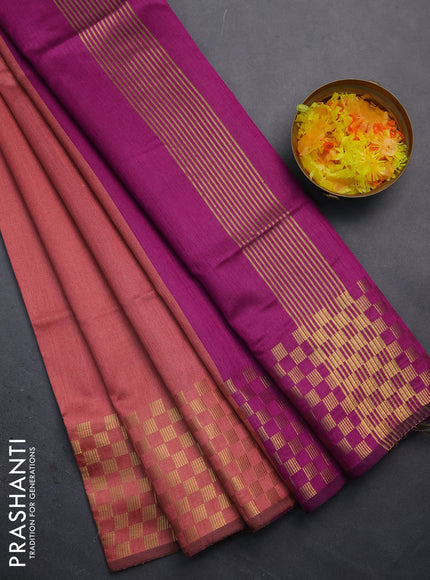 Semi dupion saree peach shade and purple with plain body and zari woven checked border