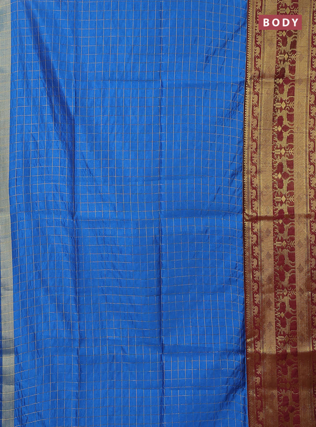 Semi dupion saree blue and maroon with allover zari checked pattern and long zari woven border