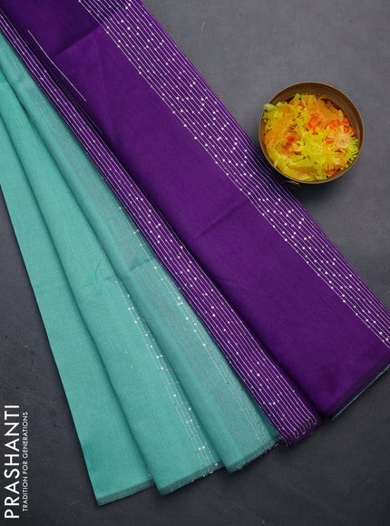 Semi dupion saree teal green and violet with allover thread & sequin weaves and sequin work pallu