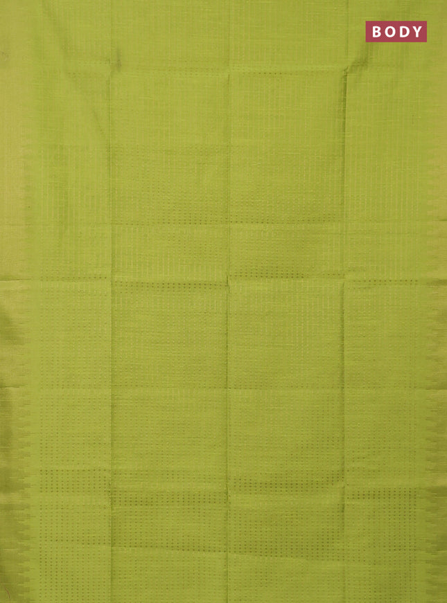 Semi dupion saree fluorescent green and purple with allover zari woven butta weaves and temple design zari woven border