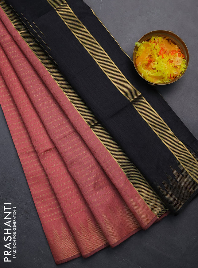 Semi dupion saree peach shade and black with allover zari woven butta weaves and temple design zari woven border