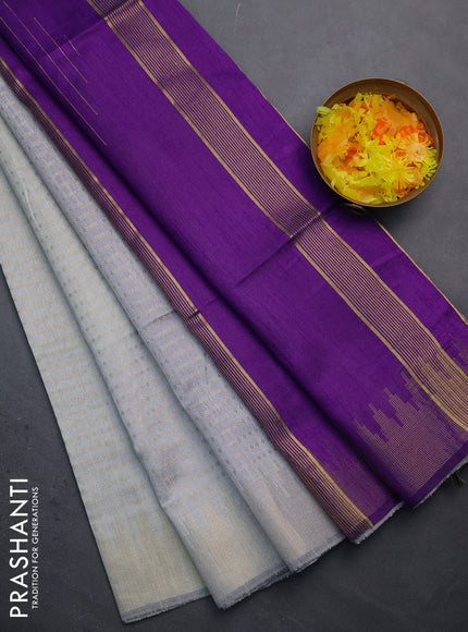 Semi dupion saree pastel grey and violet with allover zari woven butta weaves and temple design zari woven border