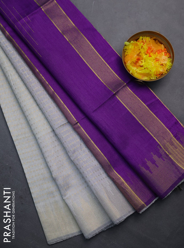 Semi dupion saree pastel grey and violet with allover zari woven butta weaves and temple design zari woven border