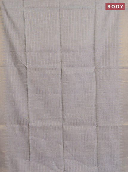 Semi dupion saree pastel grey and violet with allover zari woven butta weaves and temple design zari woven border