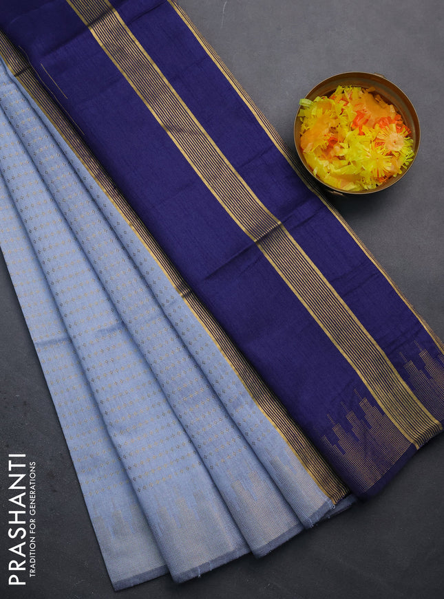 Semi dupion saree pastel blue and navy blue with allover zari woven butta weaves and temple design zari woven border