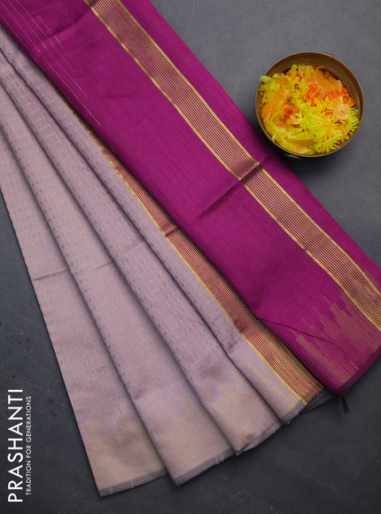 Semi dupion saree pastel pink and purple with allover zari woven butta weaves and temple design zari woven border