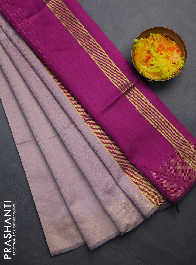 Semi dupion saree pastel pink and purple with allover zari woven butta weaves and temple design zari woven border
