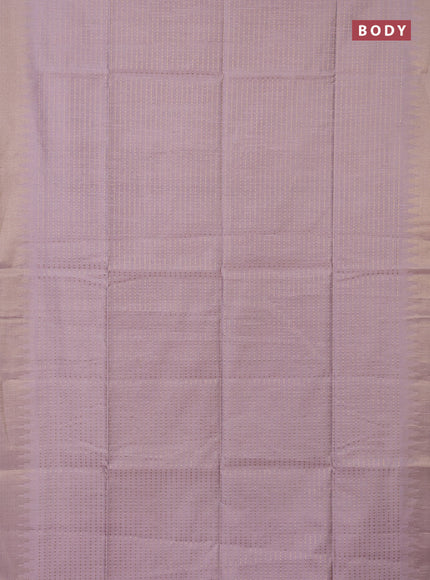 Semi dupion saree pastel pink and purple with allover zari woven butta weaves and temple design zari woven border