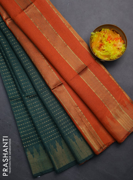 Semi dupion saree green and orange with allover zari woven butta weaves and temple design zari woven border