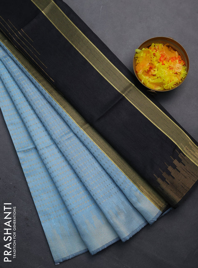 Semi dupion saree pastel blue and black with allover zari woven butta weaves and temple design zari woven border