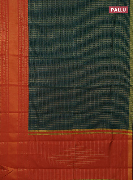 Semi dupion saree green and orange with allover zari checks & buttas and long zari woven border