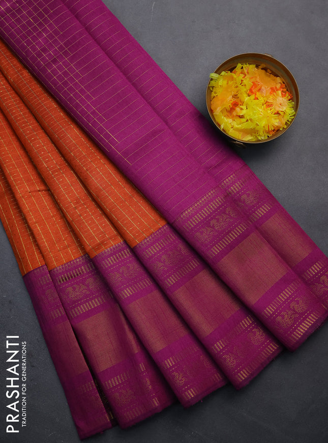 Semi dupion saree orange and purple with allover zari checks & buttas and long zari woven border