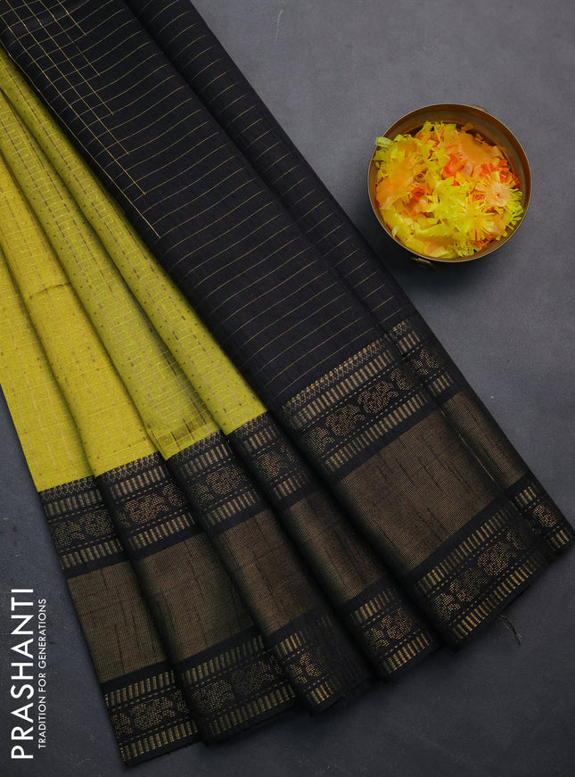 Semi dupion saree lime yellow and black with allover zari checks & buttas and long zari woven border