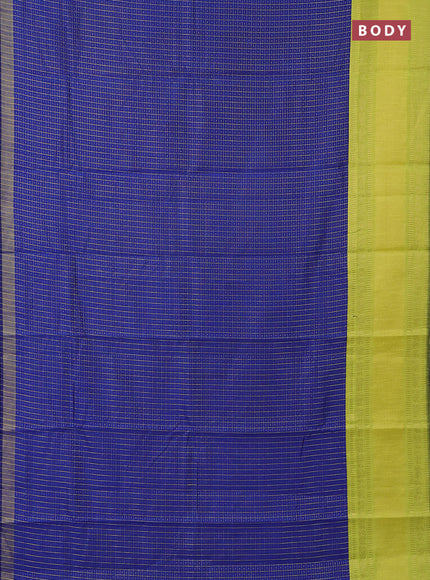 Semi dupion saree blue and fluorescent green with allover zari checks & buttas and long zari woven border