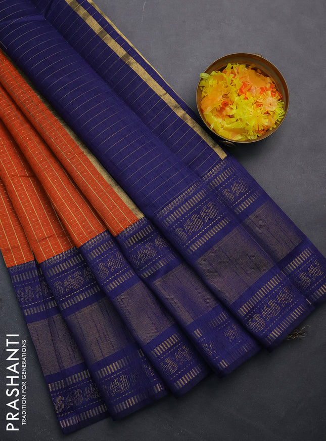 Semi dupion saree orange and navy blue with allover zari checks & buttas and long zari woven border
